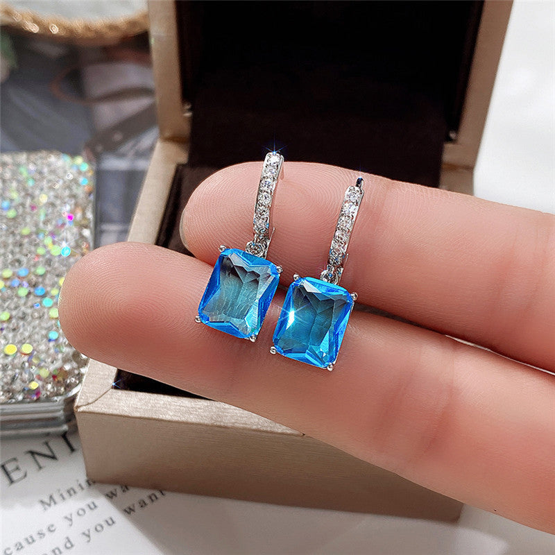 Silver Plated Anti Tarnish Blue Rectangular American Diamond Studded Crushed Ice Cut Drop Earrings