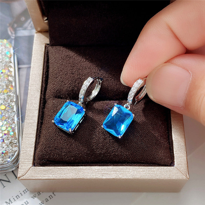 Silver Plated Anti Tarnish Blue Rectangular American Diamond Studded Crushed Ice Cut Drop Earrings