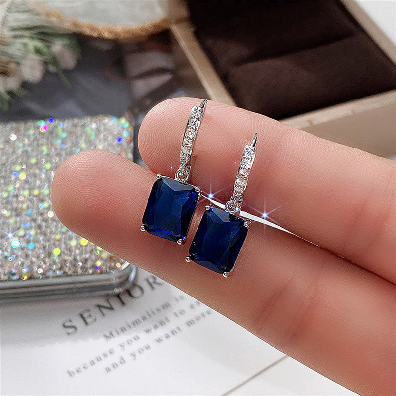 Silver Plated Anti Tarnish Navy Blue Rectangular American Diamond Studded Crushed Ice Cut Drop Earrings