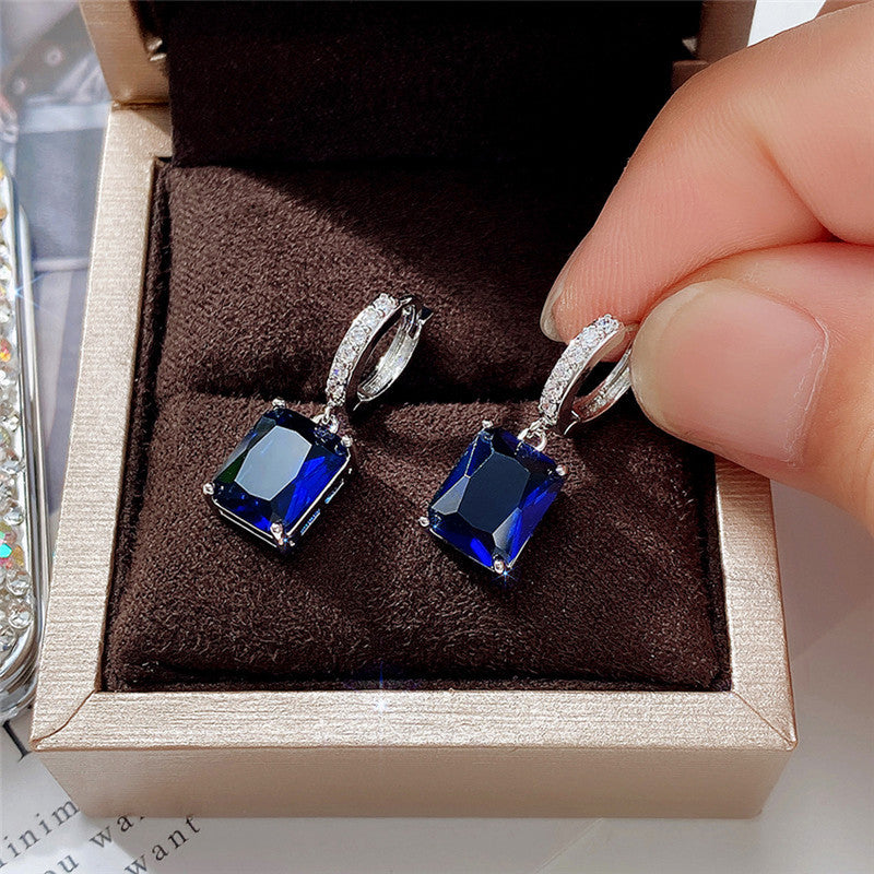 Silver Plated Anti Tarnish Navy Blue Rectangular American Diamond Studded Crushed Ice Cut Drop Earrings