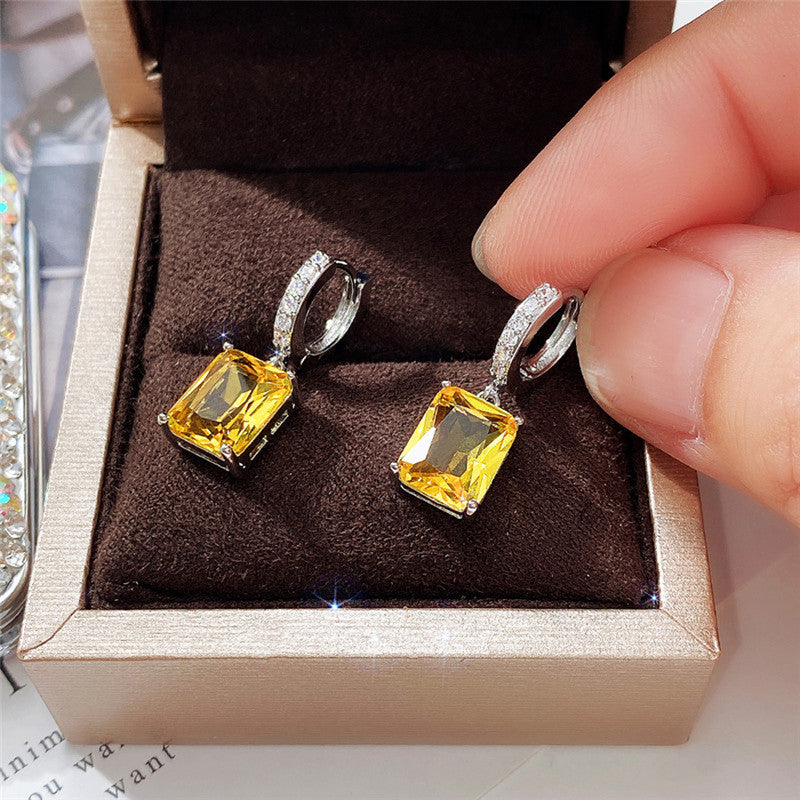 Silver Plated Anti Tarnish Yellow Rectangular American Diamond Studded Crushed Ice Cut Drop Earrings