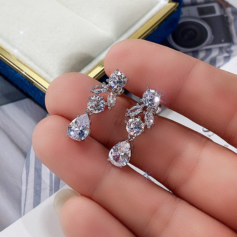 Silver Plated Anti Tarnish American Diamond Studded Floral Crushed Ice Cut Drop Earrings