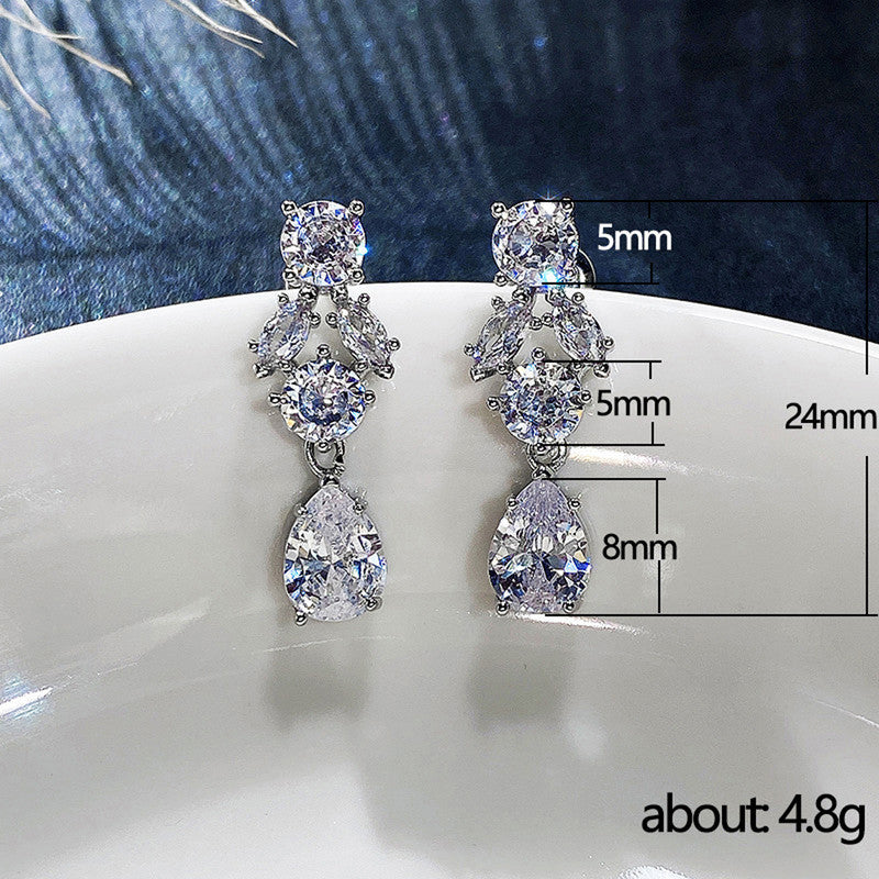 Silver Plated Anti Tarnish American Diamond Studded Floral Crushed Ice Cut Drop Earrings