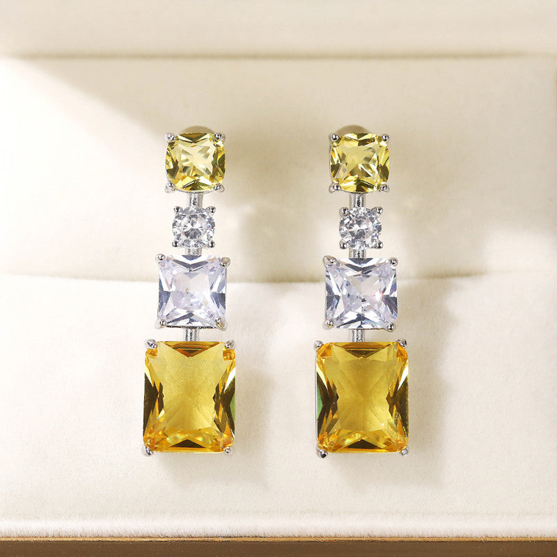 Silver Plated American Diamond Studded Yellow Geometrical Crushed Ice Cut Drop Earrings