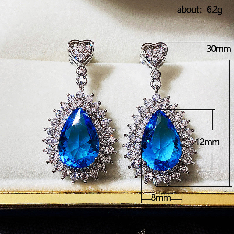 Silver Plated Anti Tarnish American Diamond Studded Blue Teardop Shape Ice Cut Drop Earrings