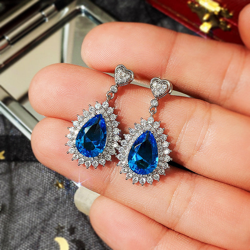 Silver Plated Anti Tarnish American Diamond Studded Blue Teardop Shape Ice Cut Drop Earrings