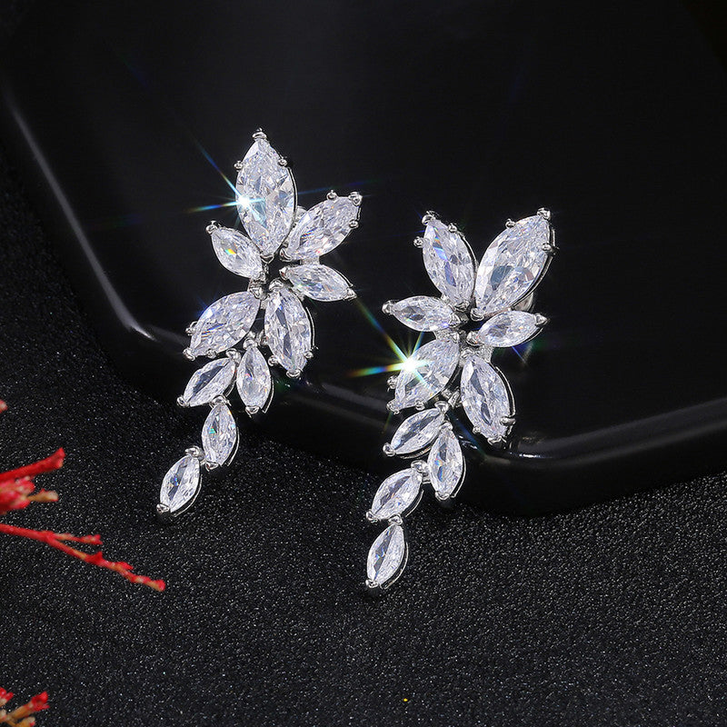 Silver Plated American Diamond Studded Floral Themed Drop Earrings