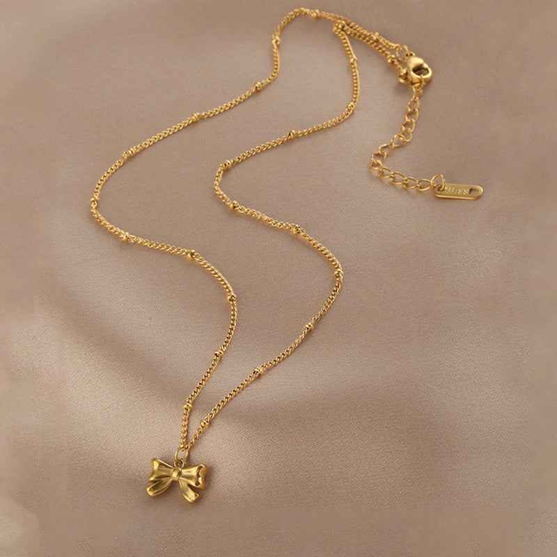 Gold Plated Stainless Steel Anti Tarnish Bow Themed Pendant