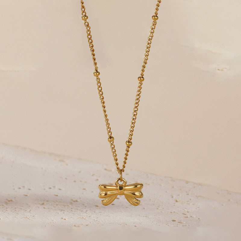 Gold Plated Stainless Steel Anti Tarnish Bow Themed Pendant