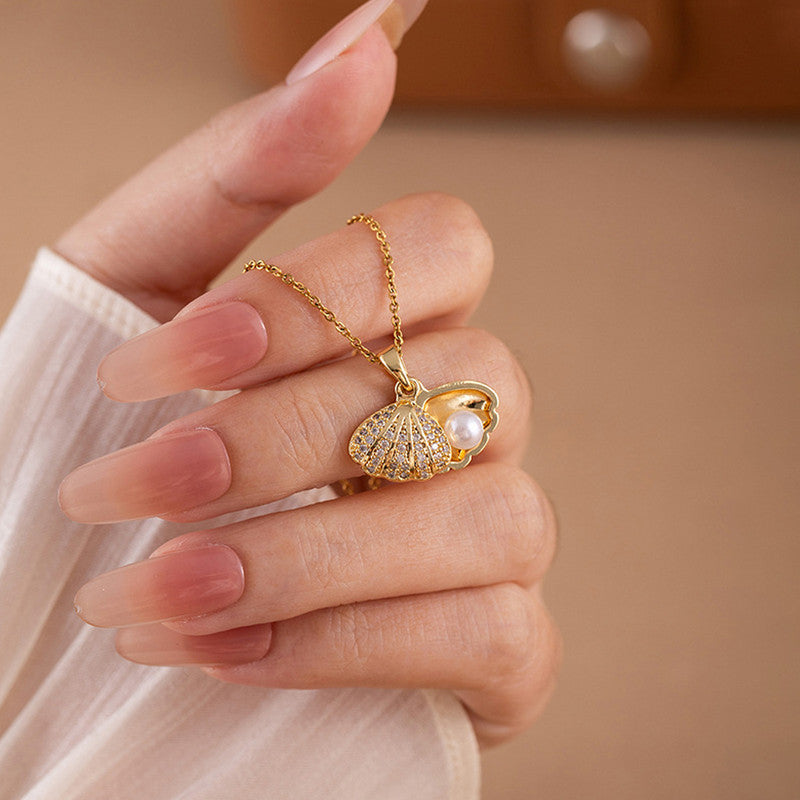 Gold Plated American Diamond Studded Shell Shaped Pendant