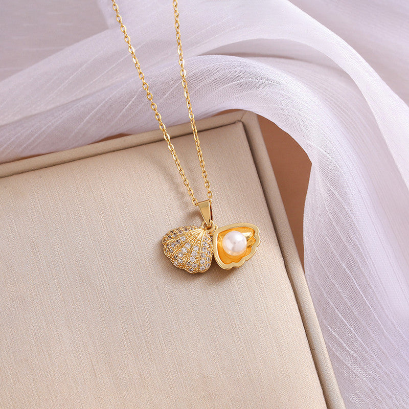 Gold Plated American Diamond Studded Shell Shaped Pendant