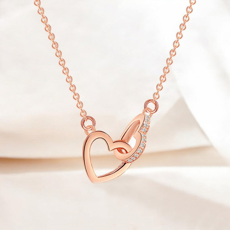Rose Gold Plated American Diamond Studded Dual Hearts Pendant