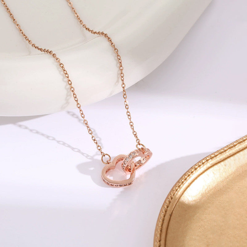 Rose Gold Plated American Diamond Studded Dual Hearts Pendant