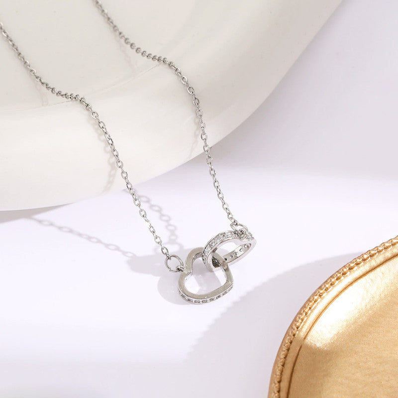 Silver Plated Anti Tarnish American Diamond Studded Dual Hearts Pendant