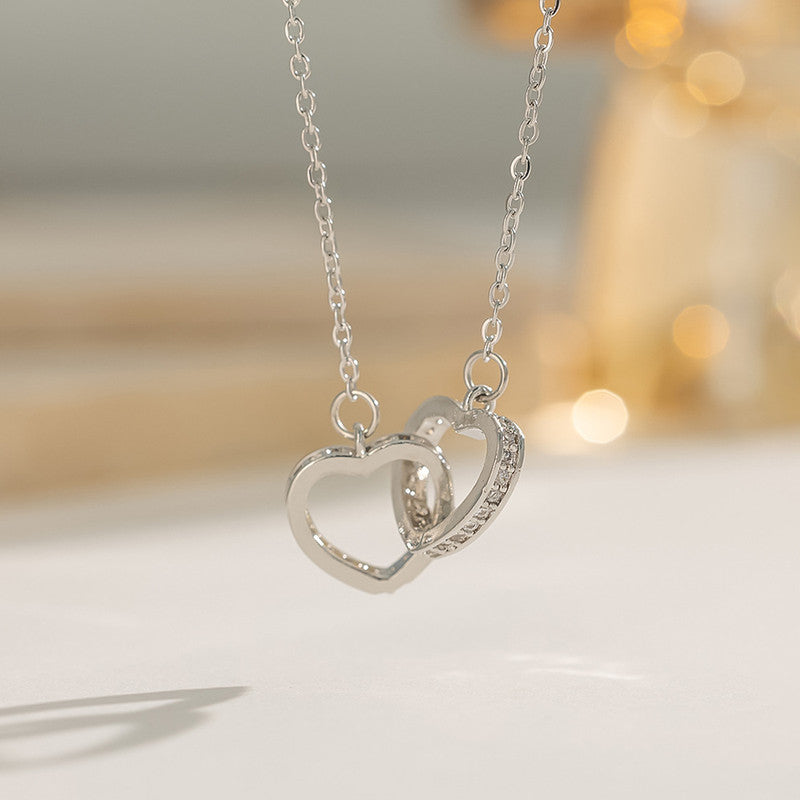 Silver Plated Anti Tarnish American Diamond Studded Dual Hearts Pendant