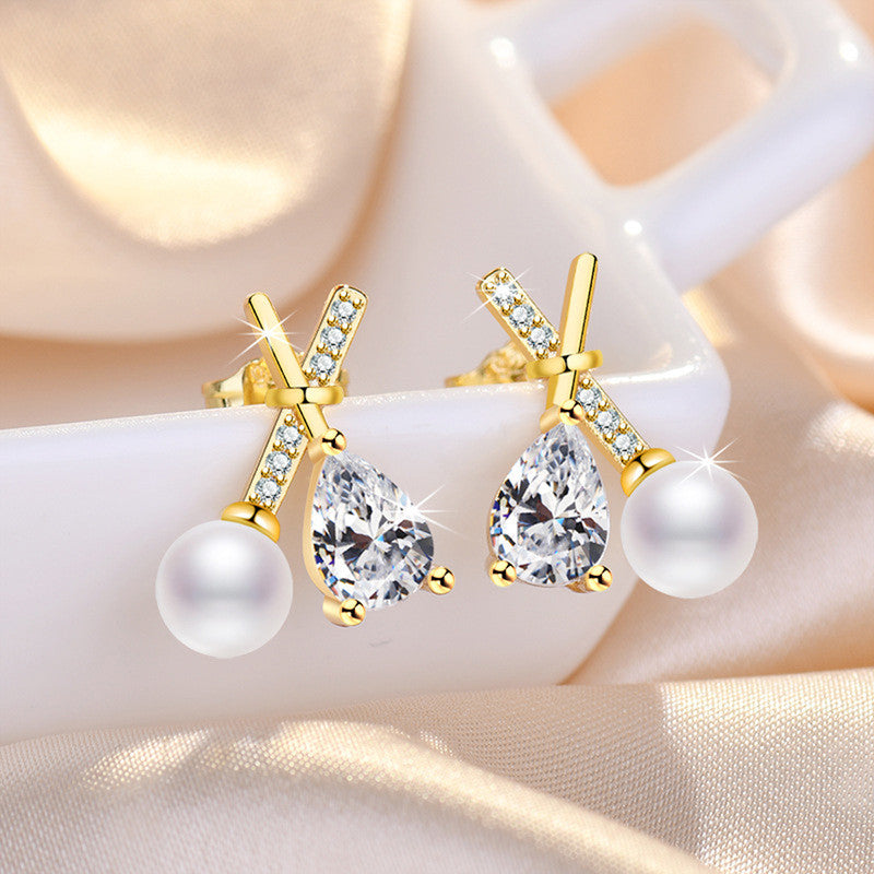 Gold Plated American Diamond Studded Cross Shape Korean Stud Earrings