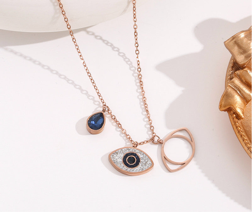 Stainless Steel Rose Gold Plated American Diamond Studded Evil Eye Pendant Necklace