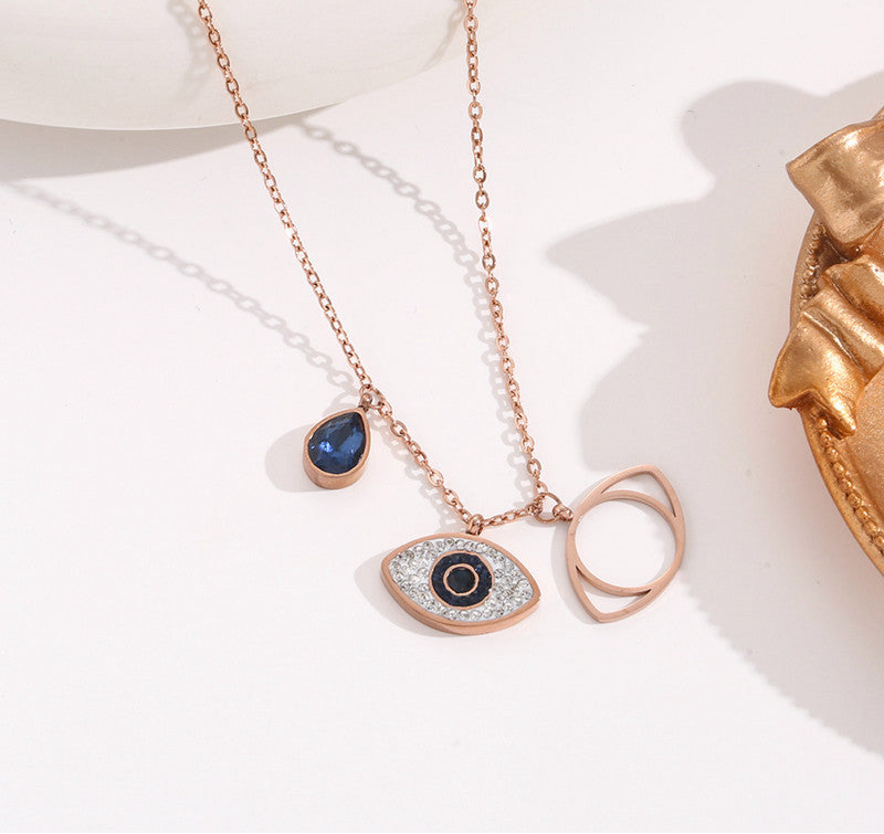Stainless Steel Rose Gold Plated American Diamond Studded Evil Eye Pendant Necklace
