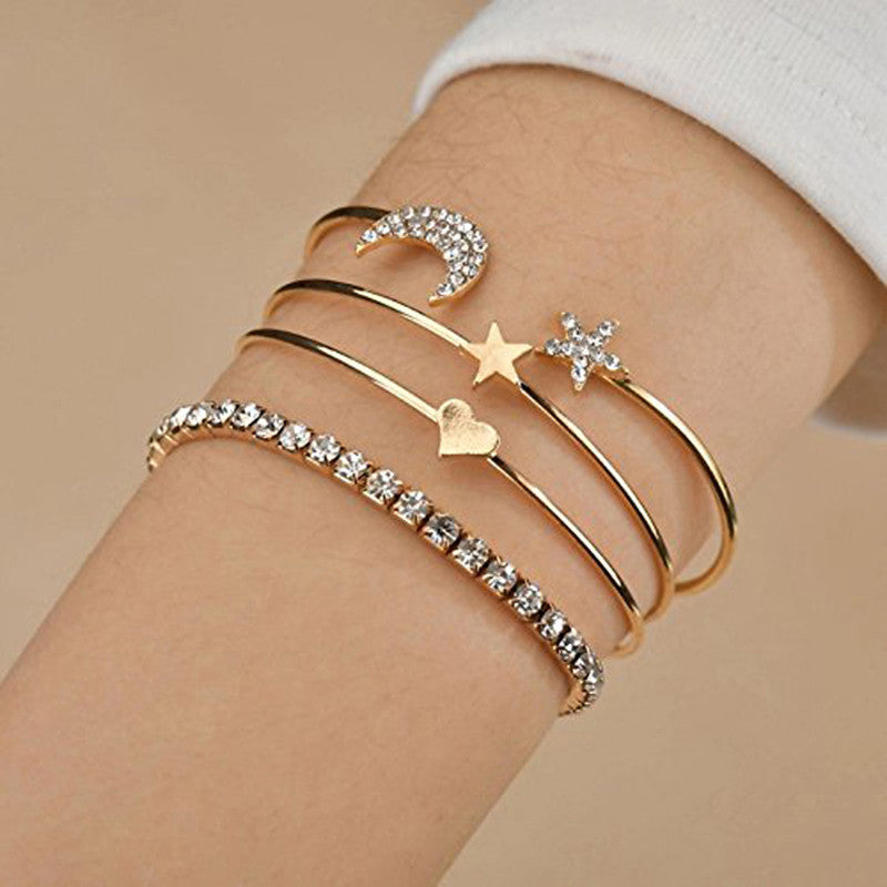 Scintillating American Diamond Star & Moon Design Gold Plated Bracelet - Pack Of 4