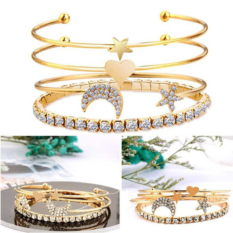 Scintillating American Diamond Star & Moon Design Gold Plated Bracelet - Pack Of 4