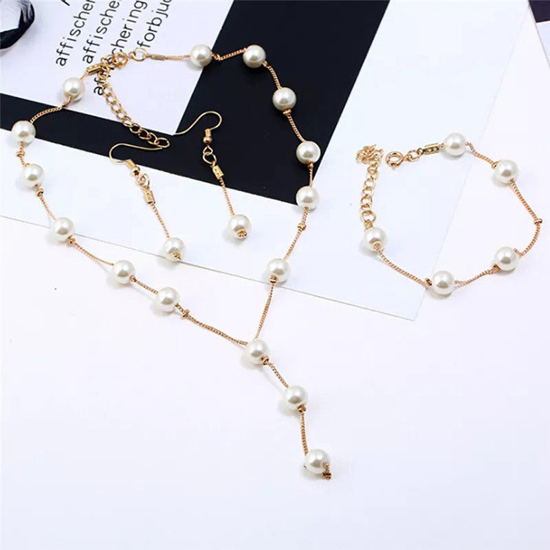 Gold Plated White Pearl Studded Multi-Piece Single-Strand Jewellery Set