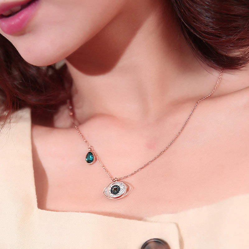 Stainless Steel Rose Gold Plated American Diamond Studded Evil Eye Pendant Necklace