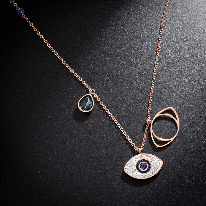 Stainless Steel Rose Gold Plated American Diamond Studded Evil Eye Pendant Necklace