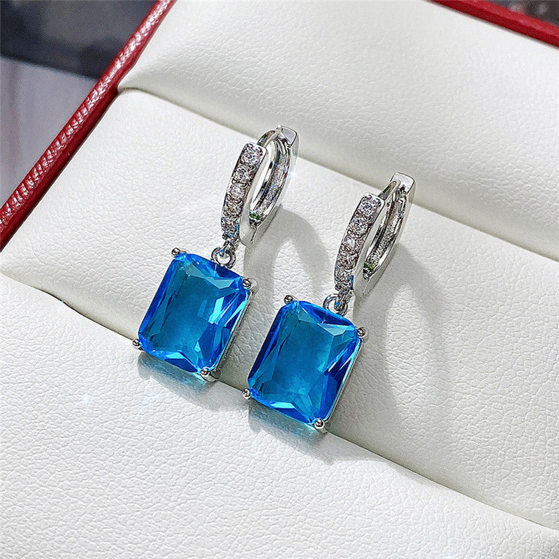 Silver Plated Anti Tarnish Blue Rectangular American Diamond Studded Crushed Ice Cut Drop Earrings