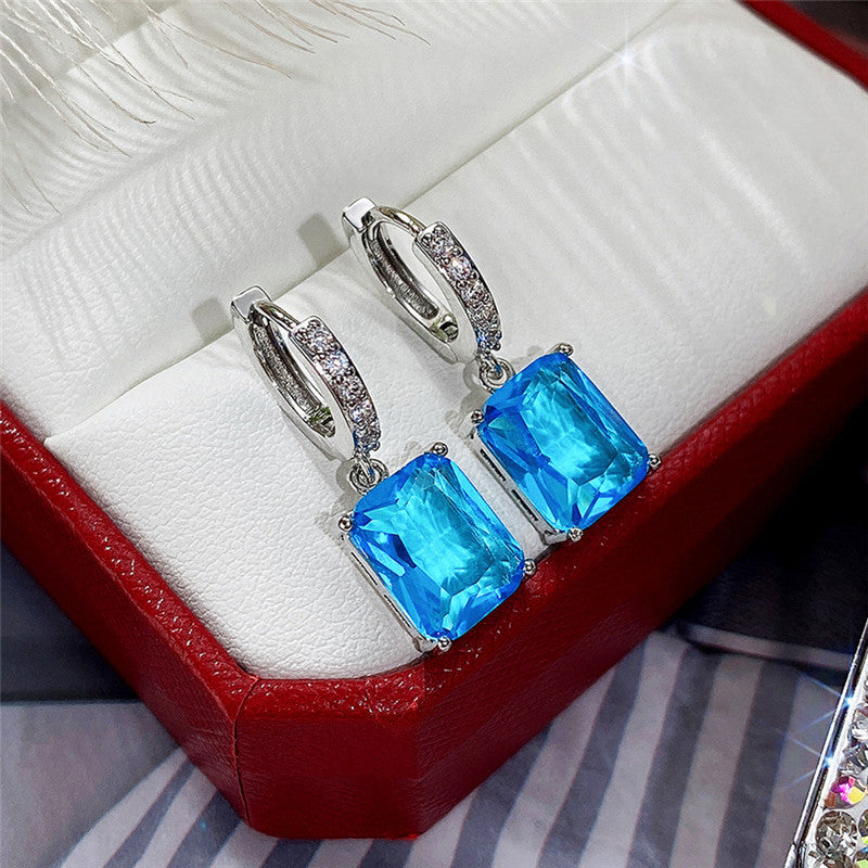 Silver Plated Anti Tarnish Blue Rectangular American Diamond Studded Crushed Ice Cut Drop Earrings