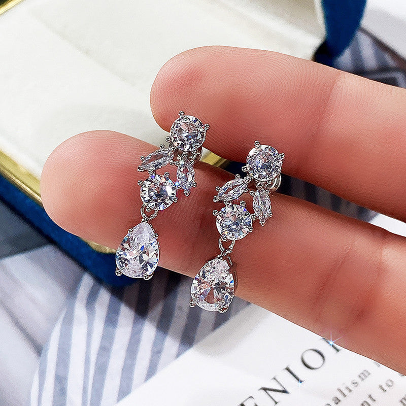Silver Plated Anti Tarnish American Diamond Studded Floral Crushed Ice Cut Drop Earrings