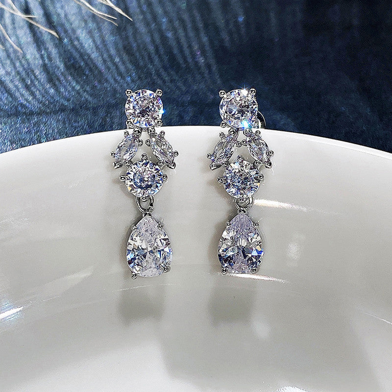 Silver Plated Anti Tarnish American Diamond Studded Floral Crushed Ice Cut Drop Earrings