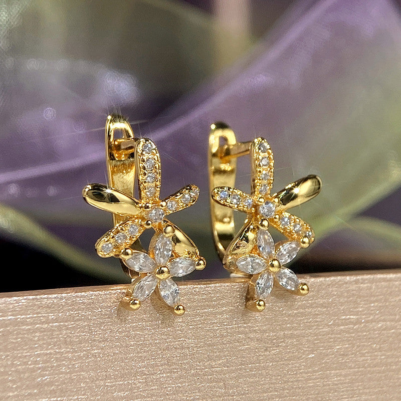 Gold Plated American Diamond Studded Dual Star Shaped Clip-On Earrings