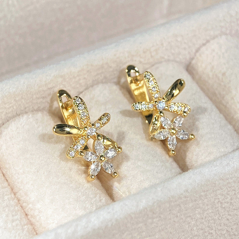 Gold Plated American Diamond Studded Dual Star Shaped Clip-On Earrings
