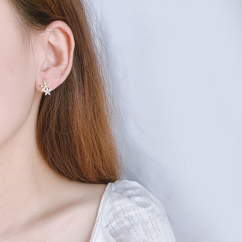 Gold Plated American Diamond Studded Dual Star Shaped Clip-On Earrings