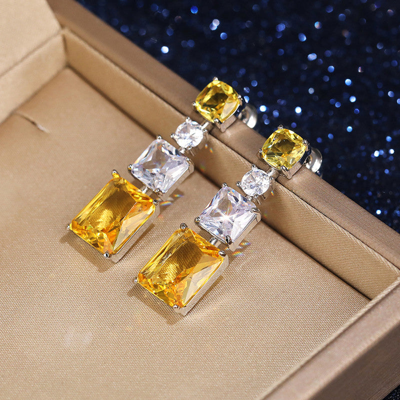 Silver Plated American Diamond Studded Yellow Geometrical Crushed Ice Cut Drop Earrings