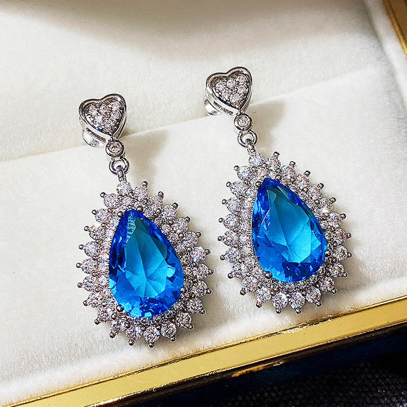 Silver Plated Anti Tarnish American Diamond Studded Blue Teardop Shape Ice Cut Drop Earrings