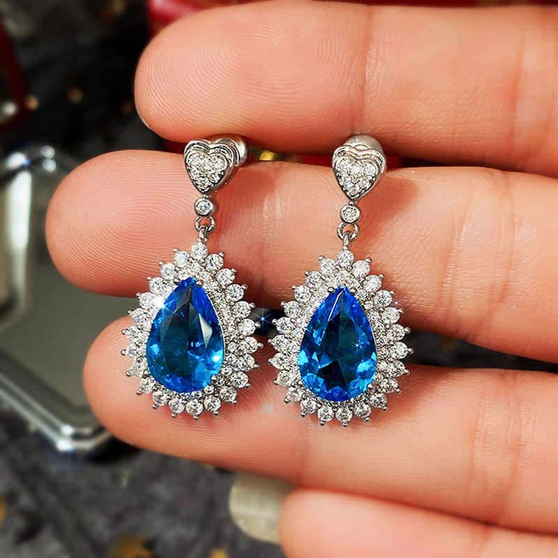 Silver Plated Anti Tarnish American Diamond Studded Blue Teardop Shape Ice Cut Drop Earrings