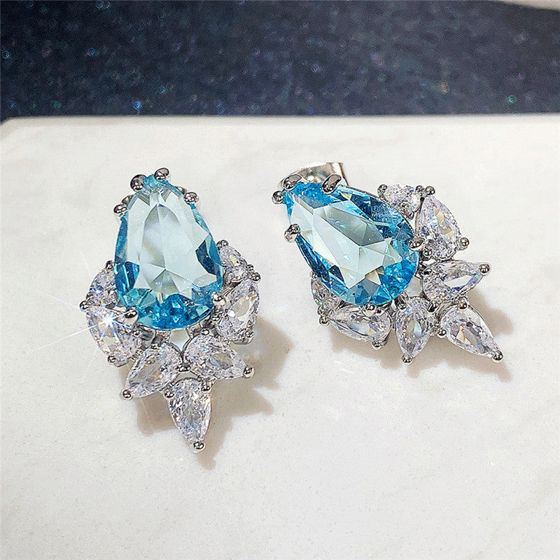 Silver Plated Anti Tarnish American Diamond Studded Blue Crushed Ice Cut Drop Earrings