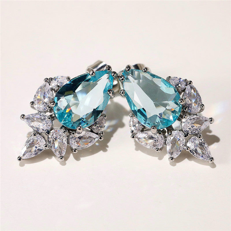 Silver Plated Anti Tarnish American Diamond Studded Blue Crushed Ice Cut Drop Earrings