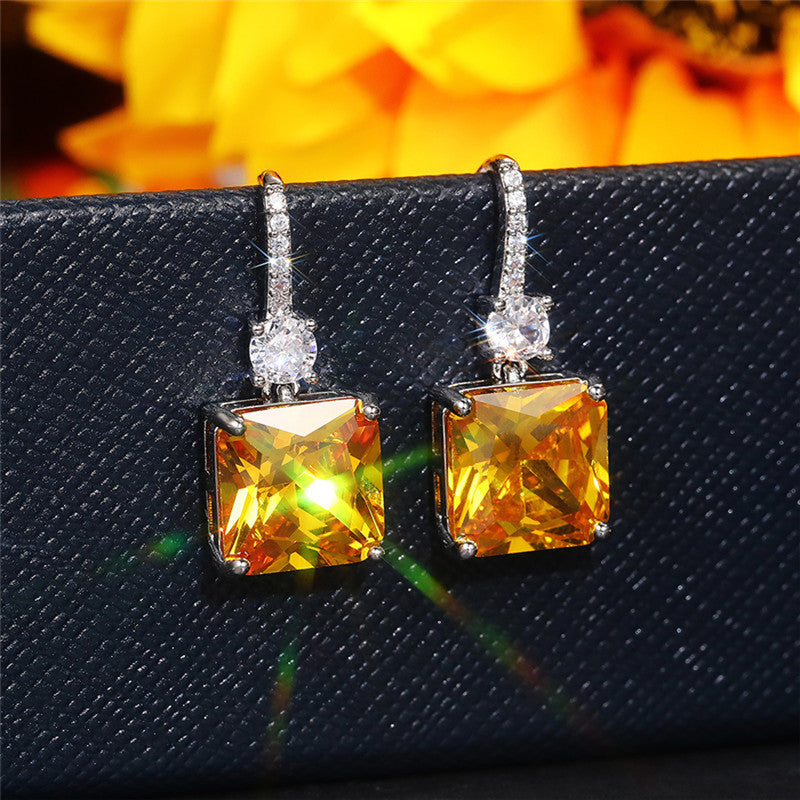 Silver Plated Anti Tarnish American Diamond Studded Yellow Square Shape Crushed Ice Cut Hanging Earrings