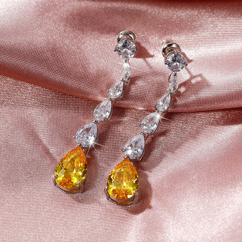 Silver Plated Anti Tarnish American Diamond Studded Yellow Teardrop Shape Crushed Ice Cut Drop Earrings