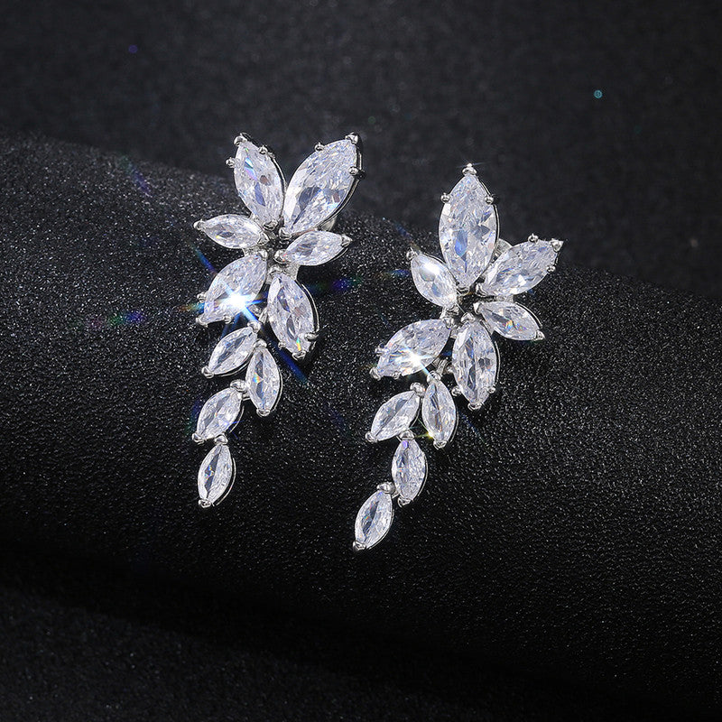Silver Plated American Diamond Studded Floral Themed Drop Earrings