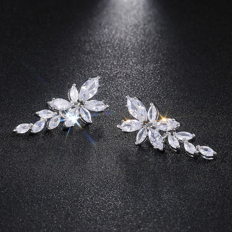 Silver Plated American Diamond Studded Floral Themed Drop Earrings