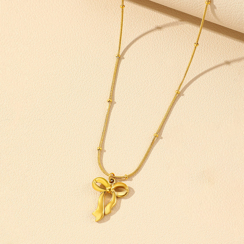 Gold Plated Anti Tarnish Stainless Steel Bow Themed Pendant