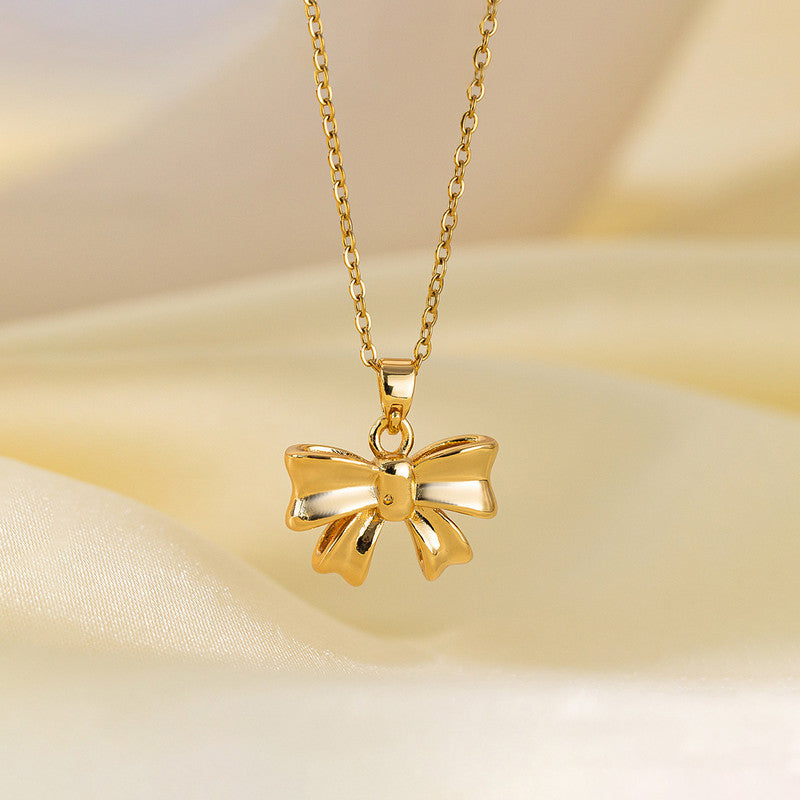 Gold Plated Anti Tarnish Stainless Steel Bow Themed Pendant