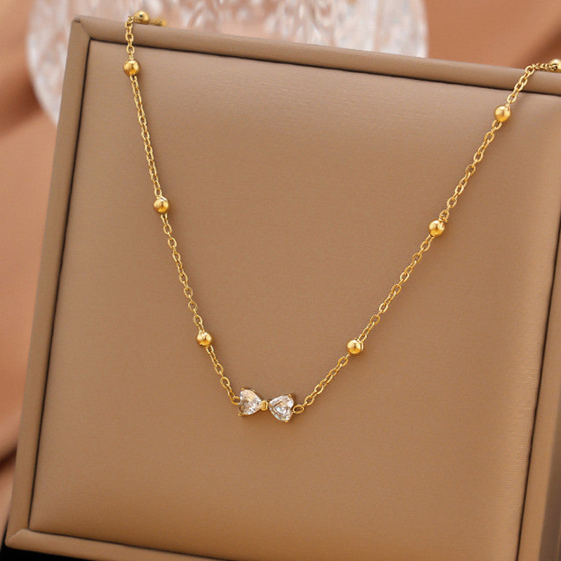 Gold Plated Anti Tarnish Stainless Steel Bow Themed Pendant