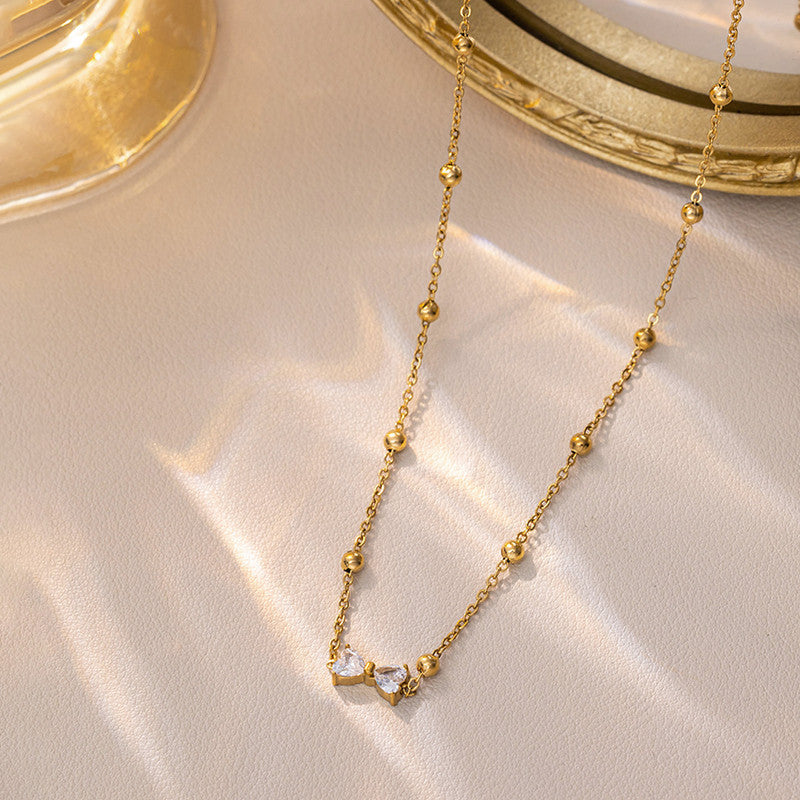 Gold Plated Anti Tarnish Stainless Steel Bow Themed Pendant