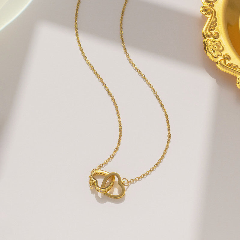 Gold Plated American Diamond Studded Dual Hearts Pendant