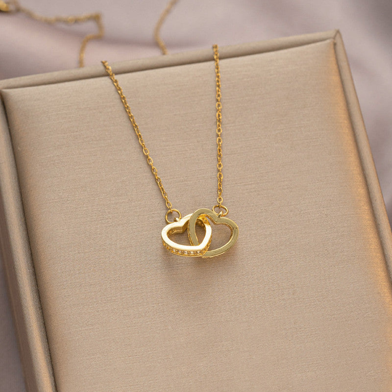 Gold Plated American Diamond Studded Dual Hearts Pendant