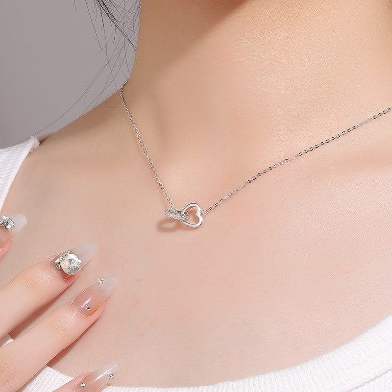 Silver Plated Anti Tarnish American Diamond Studded Dual Hearts Pendant